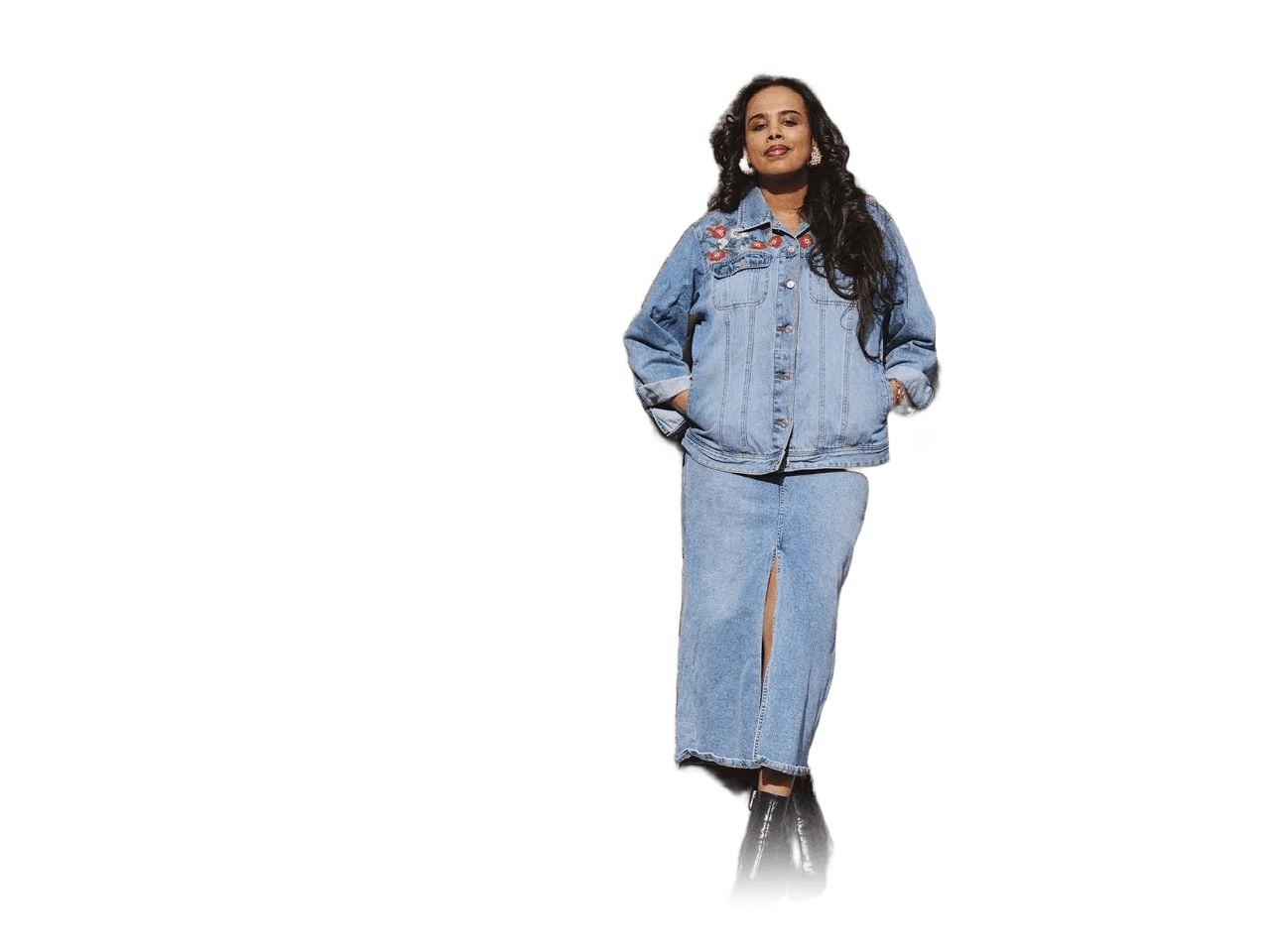 Meseret Haileyesus photographed against a stone wall