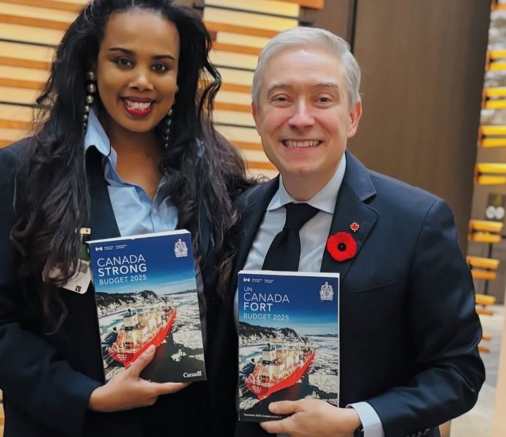 Meseret Haileyesus holding Budget 2025 with the Minister of Finance